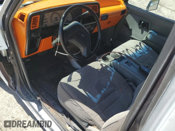 1992 Ford Ranger with VIN 1FTCR10AXNUC80706, listed as a Copart auction lot 55174895 with 87,000 mi miles and Salvage title. Bid and sale history available at DreamBid. Image 8.