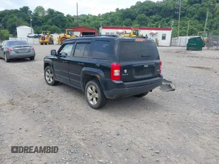 2014 Jeep Patriot Latitude with VIN 1C4NJRFB0ED892203, listed as a IAAI auction lot 42617739 with 100,607 mi miles and . Bid and sale history available at DreamBid. Image 3.