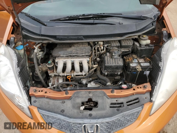 2009 Honda Fit Sport z VIN JHMGE88429S025410, wystawiony jako Copart lot #84963934 z przebiegiem 122 807 mil mil oraz Szkoda całkowita • Salvage title. Historia ofert i sprzedaży dostępna na DreamBid. Obrazek 12.