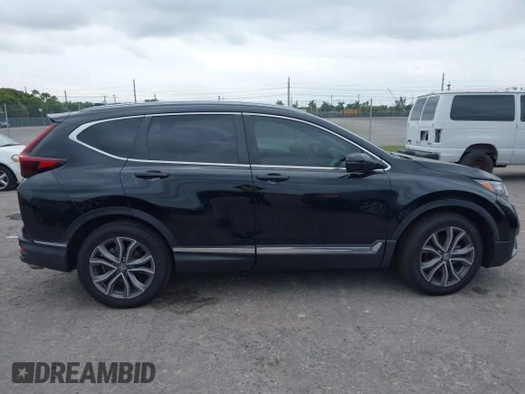 2021 Honda CR-V Touring with VIN 2HKRW1H91MH410751, listed as a IAAI auction lot 41286168 with 56,314 mi miles. Bid and sale history available at carsss.com. Image 13.