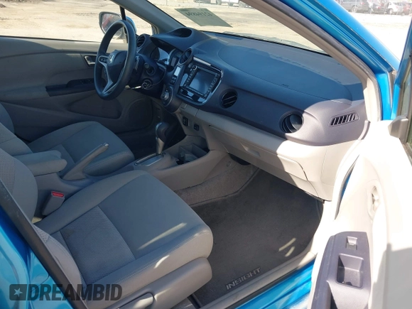 2010 Honda Insight EX with VIN JHMZE2H74AS013148, listed as a IAAI auction lot 42194894 with 114,885 mi miles and . Bid and sale history available at DreamBid. Image 5.