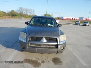 2007 Mitsubishi Raider LS z VIN 1Z7HC28K77S109408, wystawiony jako IAAI lot #41930963 z przebiegiem 135 800 mil mil oraz . Historia ofert i sprzedaży dostępna na DreamBid. Obrazek 6.
