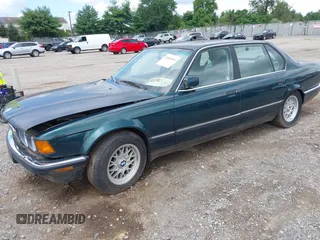 1994 BMW 7 Series with VIN WBAGD8320RDE90248, listed as a IAAI auction lot 42685094 with Not provided miles and . Bid and sale history available at DreamBid. Image 2.