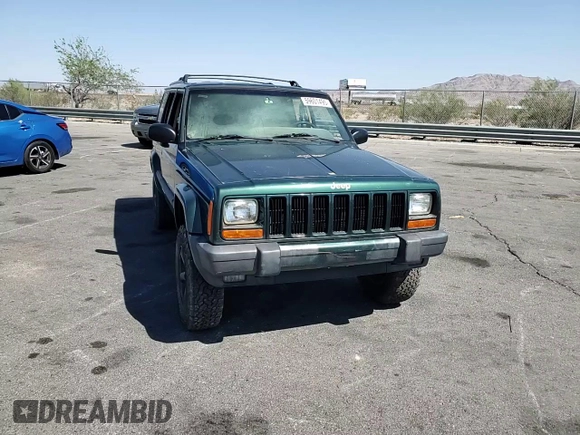 2001 Jeep Cherokee Sport with VIN 1J4FF48S91L610463, listed as a Copart auction lot 59601495 with Not provided miles and Salvage title. Bid and sale history available at DreamBid. Image 14.