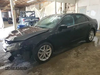 2012 Ford Fusion SEL with VIN 3FAHP0JA4CR271112, listed as a Copart auction lot 61986375 with 214,204 mi miles and Salvage title. Bid and sale history available at DreamBid. Image 1.