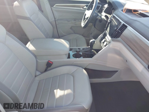 2021 Volkswagen Atlas SEL Premium z VIN 1V2TR2CA8MC562198, wystawiony jako IAAI lot #41853528 z przebiegiem 57 413 mil mil oraz . Historia ofert i sprzedaży dostępna na DreamBid. Obrazek 5.