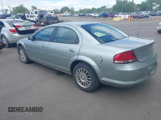 2004 Chrysler Sebring Touring with VIN 1C3AL56R74N412427, listed as a IAAI auction lot 42199777 with 103,265 mi miles and . Bid and sale history available at DreamBid. Image 3.