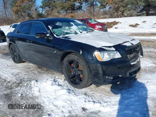 2012 Chrysler 300 S with VIN 2C3CCABG7CH140782, listed as a IAAI auction lot 41343344 with 244,577 mi miles and . Bid and sale history available at carsss.com. Image 1.