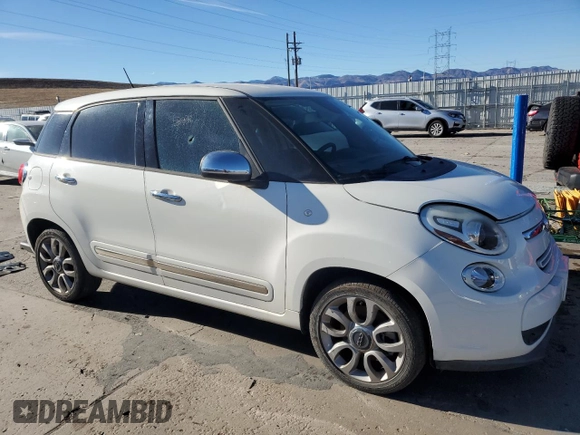 2014 FIAT 500L Lounge with VIN ZFBCFACH5EZ017403, listed as a Copart auction lot 83652624 with 30,905 mi miles and Clean Title. Bid and sale history available at DreamBid. Image 4.