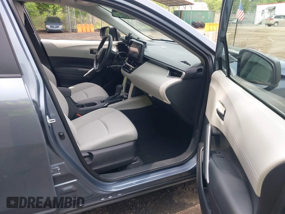 2023 Toyota Corolla Cross L with VIN 7MUAAAAGXPV060044, listed as a IAAI auction lot 42289062 with 29,837 mi miles and . Bid and sale history available at DreamBid. Image 5.