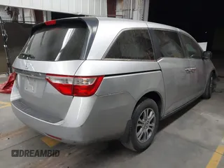 2011 Honda Odyssey EX-L with VIN 5FNRL5H62BB083682, listed as a IAAI auction lot 41425267 with 169,166 mi miles and . Bid and sale history available at carsss.com. Image 4.