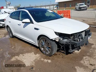 2018 Kia Optima SX with VIN 5XXGV4L21JG215617, listed as a IAAI auction lot 41858749 with 168,180 mi miles and . Bid and sale history available at DreamBid. Image 1.