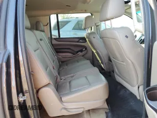 2015 Chevrolet Suburban LT z VIN 1GNSKJKC2FR508045, wystawiony jako Copart lot #56676985 z przebiegiem 120 436 mil mil oraz Szkoda całkowita • Salvage title. Historia ofert i sprzedaży dostępna na DreamBid. Obrazek 11.