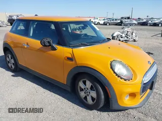 2014 MINI Hardtop with VIN WMWXM5C53ET934034, listed as a IAAI auction lot 42375051 with 73,046 mi miles and . Bid and sale history available at DreamBid. Image 1.
