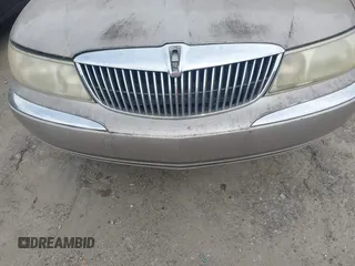 2000 Lincoln Continental with VIN 1LNHM97V3YY874672, listed as a IAAI auction lot 41970533 with 151,915 mi miles. Bid and sale history available at carsss.com. Image 6.