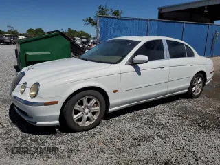 2003 Jaguar S-Type with VIN SAJEA01T93FM54729, listed as a Copart auction lot 49589035 with 162,737 mi miles and Salvage Title. Bid and sale history available at DreamBid. Image 1.