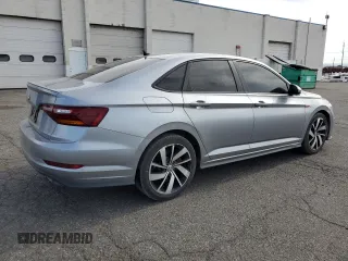 2019 Volkswagen Jetta GLI S z VIN 3VW6T7BU1KM244828, wystawiony jako Copart lot #56495205 z przebiegiem 112 512 mil mil oraz Szkody całkowita. Historia ofert i sprzedaży dostępna na DreamBid. Obrazek 3.