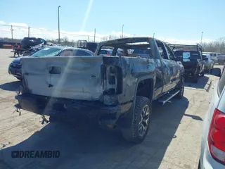 2015 GMC Sierra 1500 SLT with VIN 3GTU2VEJ2FG322198, listed as a IAAI auction lot 42031059 with Not Provided miles and . Bid and sale history available at DreamBid. Image 4.