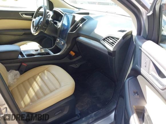 2021 Ford Edge SEL z VIN 2FMPK4J98MBA50772, wystawiony jako IAAI lot #42224052 z przebiegiem 76 061 mil mil oraz . Historia ofert i sprzedaży dostępna na DreamBid. Obrazek 5.