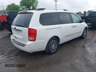 2012 Kia Sedona EX with VIN KNDMH4C76C6457908, listed as a IAAI auction lot 42179927 with 196,104 mi miles and . Bid and sale history available at DreamBid. Image 4.