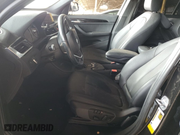 2018 BMW X1 sDrive28i with VIN WBXHU7C34J5L05725, listed as a Copart auction lot 49228475 with 69,994 mi miles and Salvage Title. Bid and sale history available at carsss.com. Image 7.