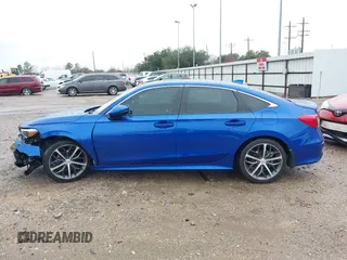 2023 Honda Civic Touring z VIN 2HGFE1F92PH317695, wystawiony jako IAAI lot #41556915 z przebiegiem 20 421 mil mil oraz . Historia ofert i sprzedaży dostępna na DreamBid. Obrazek 15.