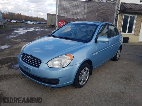 2007 Hyundai Accent GL z VIN KMHCN45C97U146808, wystawiony jako Copart lot #70781004 z przebiegiem Nie podano mil oraz Szkoda całkowita • Salvage title. Historia ofert i sprzedaży dostępna na DreamBid. Obrazek 1.