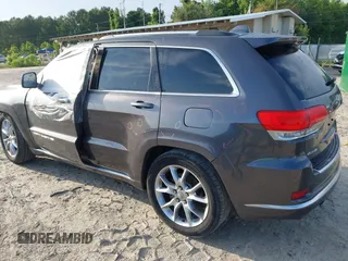 2015 Jeep Grand Cherokee Summit with VIN 1C4RJFJG0FC611768, listed as a IAAI auction lot 42468497 with 217,032 mi miles and . Bid and sale history available at DreamBid. Image 3.