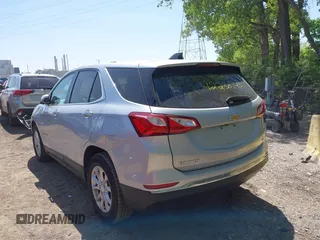 2018 Chevrolet Equinox LT z VIN 2GNAXJEV5J6309683, wystawiony jako IAAI lot #42238143 z przebiegiem 77 164 mil mil oraz . Historia ofert i sprzedaży dostępna na DreamBid. Obrazek 3.
