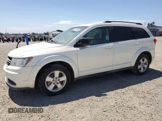 2013 Dodge Journey American Value z VIN 3C4PDCAB2DT547459, wystawiony jako Copart lot #61217605 z przebiegiem 116 740 mil mil oraz Czysty tytuł • Clean title. Historia ofert i sprzedaży dostępna na DreamBid. Obrazek 1.