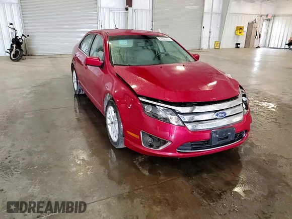 2012 Ford Fusion SEL z VIN 3FAHP0JG0CR265666, wystawiony jako Copart lot #62860355 z przebiegiem 126 812 mil mil oraz Szkoda całkowita • Salvage title. Historia ofert i sprzedaży dostępna na DreamBid. Obrazek 13.
