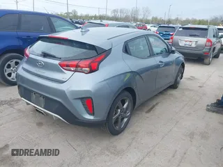 2019 Hyundai Veloster 2.0 with VIN KMHTG6AF0KU017161, listed as a IAAI auction lot 42104203 with 92,420 mi miles. Bid and sale history available at carsss.com. Image 4.