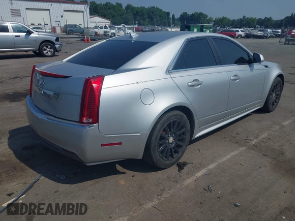 2012 Cadillac CTS with VIN 1G6DC5E51C0156873, listed as a IAAI auction lot 42587421 with 169,006 mi miles and . Bid and sale history available at DreamBid. Image 4.