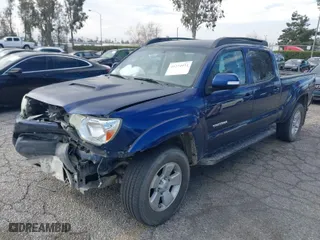 2015 Toyota Tacoma with VIN 3TMMU4FN0FM077148, listed as a IAAI auction lot 41274934 with 112,617 mi miles. Bid and sale history available at carsss.com. Image 2.