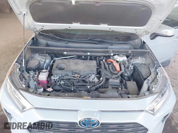 2020 Toyota RAV4 Hybrid XLE with VIN 2T3RWRFV0LW082793, listed as a IAAI auction lot 41674569 with 50,224 mi miles and . Bid and sale history available at DreamBid. Image 10.