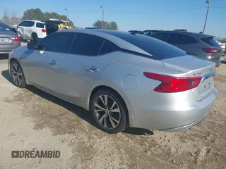 2016 Nissan Maxima SL with VIN 1N4AA6AP6GC448161, listed as a IAAI auction lot 41709077 with 133,288 mi miles and . Bid and sale history available at DreamBid. Image 3.