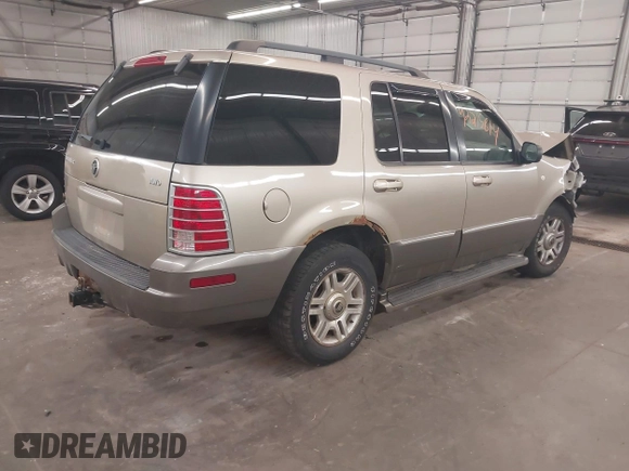 2003 Mercury Mountaineer Convenience z VIN 4M2ZU86K23ZJ06043, wystawiony jako IAAI lot #42215814 z przebiegiem 259 172 mil mil oraz . Historia ofert i sprzedaży dostępna na DreamBid. Obrazek 4.