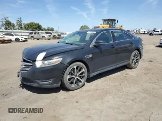 2014 Ford Taurus SEL z VIN 1FAHP2E87EG131505, wystawiony jako Copart lot #57909385 z przebiegiem 142 277 mil mil oraz Szkody całkowita. Historia ofert i sprzedaży dostępna na DreamBid. Obrazek 1.
