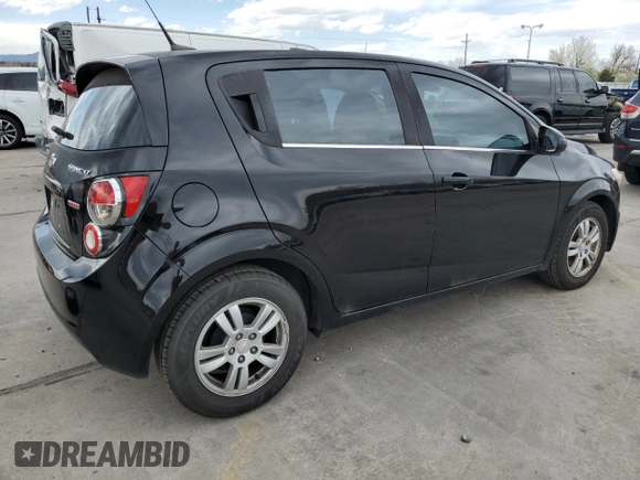 2012 Chevrolet Sonic LT with VIN 1G1JC6SB7C4200604, listed as a Copart auction lot 52843945 with 101,039 mi miles and Salvage Title. Bid and sale history available at carsss.com. Image 3.
