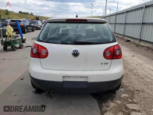 2009 Volkswagen Rabbit S with VIN WVWDB71K79W085935, listed as a Copart auction lot 60697594 with 102,780 mi miles and Salvage title. Bid and sale history available at DreamBid. Image 6.