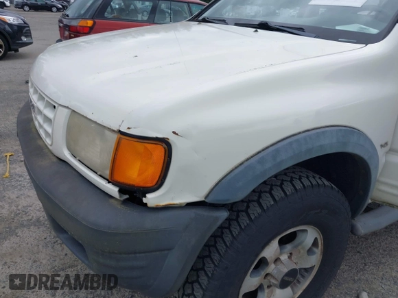 1998 Isuzu Rodeo with VIN 4S2CM57W9W4373049, listed as a IAAI auction lot 42599157 with 140,368 mi miles and . Bid and sale history available at DreamBid. Image 6.