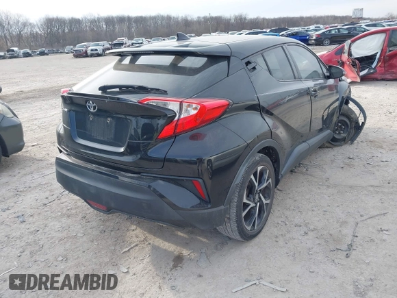 2018 Toyota C-HR XLE with VIN NMTKHMBX9JR001731, listed as a IAAI auction lot 41835918 with 138,087 mi miles. Bid and sale history available at carsss.com. Image 4.