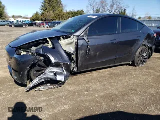 2024 Tesla Model Y Performance with VIN 7SAYGDEF2RA323192, listed as a Copart auction lot 49386595 with 5,044 mi miles and Salvage Title. Bid and sale history available at DreamBid. Image 1.