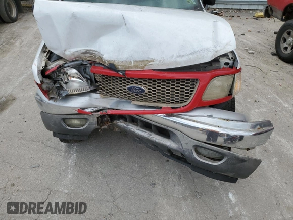 2002 Ford F-150 XL z VIN 1FTRF18W92NB71226, wystawiony jako Copart lot #76082214 z przebiegiem Nie podano mil oraz Szkoda całkowita • Salvage title. Historia ofert i sprzedaży dostępna na DreamBid. Obrazek 11.