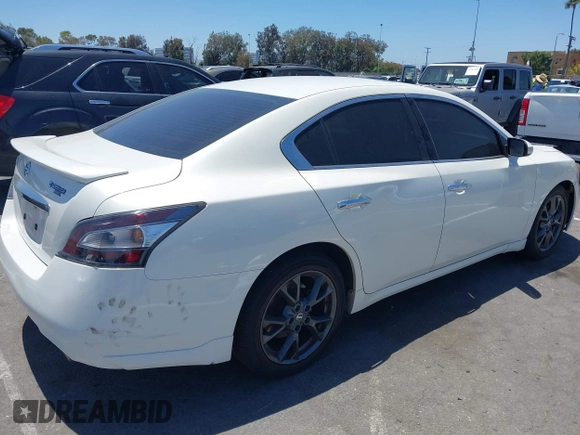 2014 Nissan Maxima SV with VIN 1N4AA5AP4EC907890, listed as a IAAI auction lot 42710257 with 125,659 mi miles and . Bid and sale history available at DreamBid. Image 4.