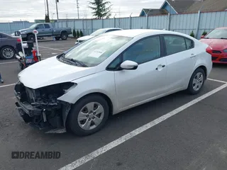 2015 Kia Forte LX with VIN KNAFX4A64F5429778, listed as a IAAI auction lot 41732846 with 167,253 mi miles. Bid and sale history available at carsss.com. Image 2.