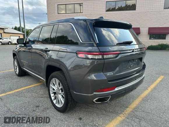2023 Jeep Grand Cherokee Summit with VIN 1C4RJHEG2P8882566, listed as a Copart auction lot 65095905 with 59,970 mi miles and Salvage title. Bid and sale history available at DreamBid. Image 3.