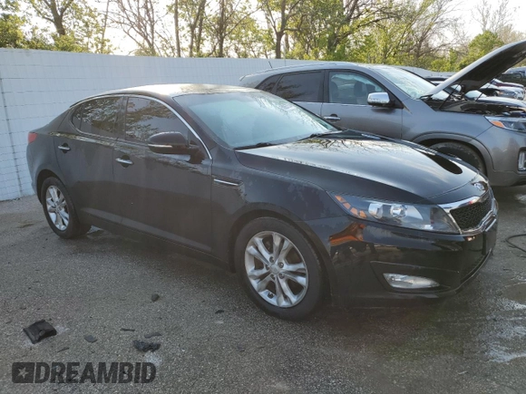2012 Kia Optima EX with VIN 5XXGN4A74CG009290, listed as a Copart auction lot 50967574 with 217,906 mi miles and Salvage Title. Bid and sale history available at carsss.com. Image 4.