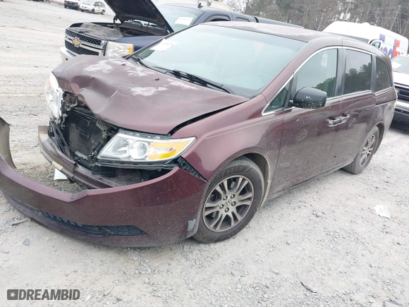 2012 Honda Odyssey EX with VIN 5FNRL5H48CB104969, listed as a IAAI auction lot 41208438 with 198,649 mi miles. Bid and sale history available at carsss.com. Image 2.