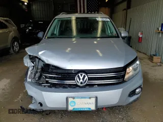 2013 Volkswagen Tiguan SE with VIN WVGBV7AX1DW504036, listed as a Copart auction lot 61126145 with 148,399 mi miles and Salvage title. Bid and sale history available at DreamBid. Image 5.